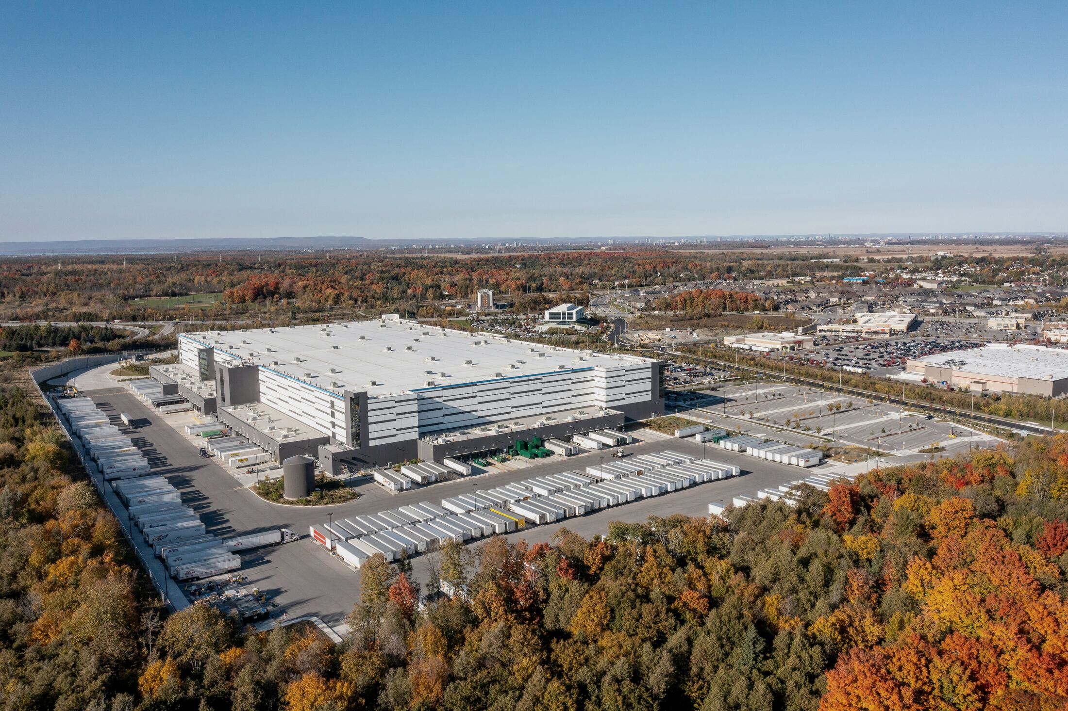 Aerial elevation of a logistics and retail asset with the surrounding parcel