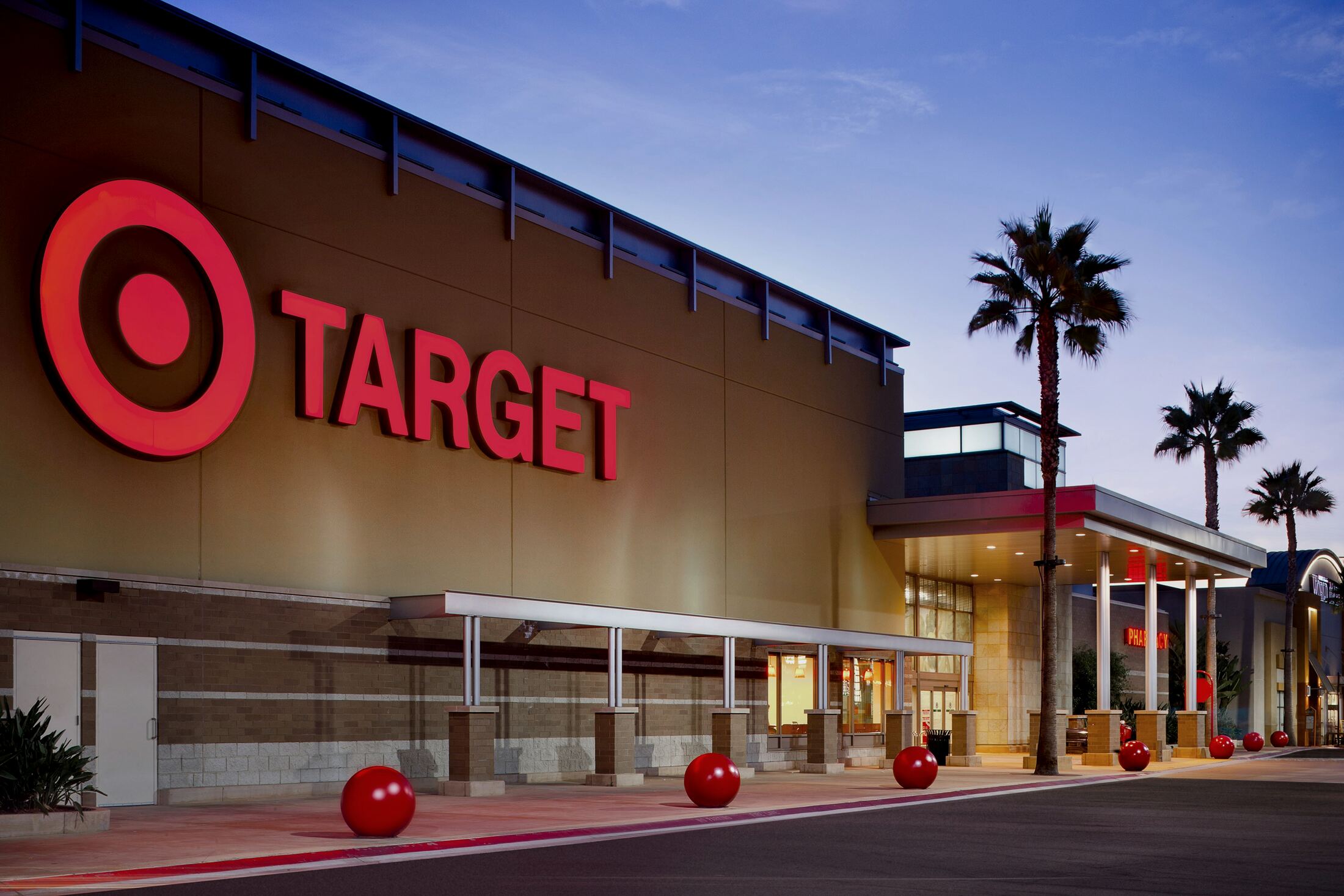 Retail anchor store exterior at dusk